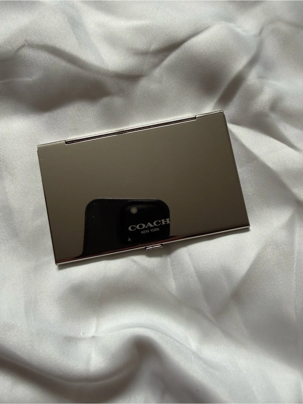 Coach compact metal
